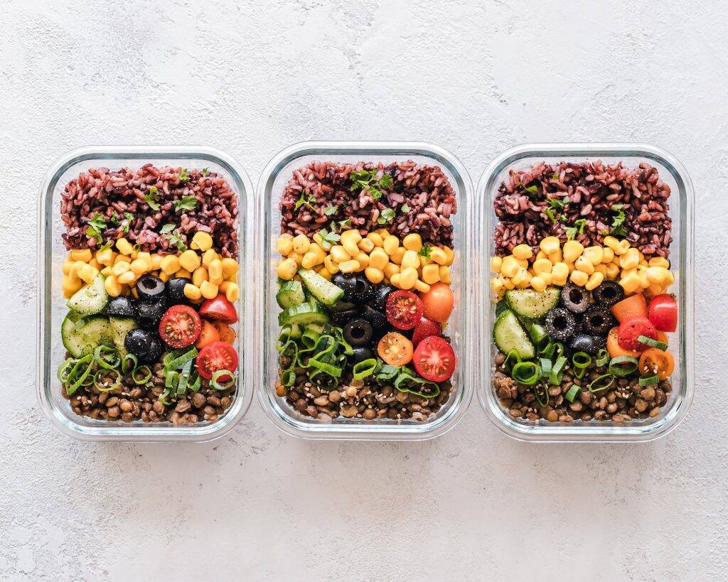 flat lay photography of three tray of foods